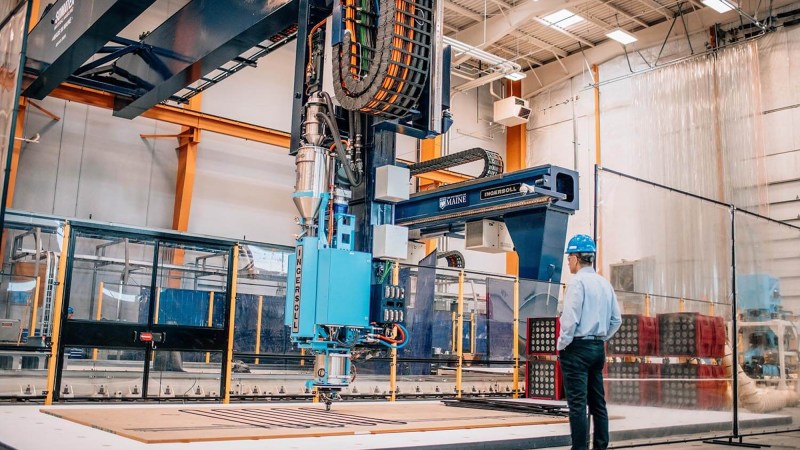 Factory of the Future 1.0 3D printer with man standing in front of it