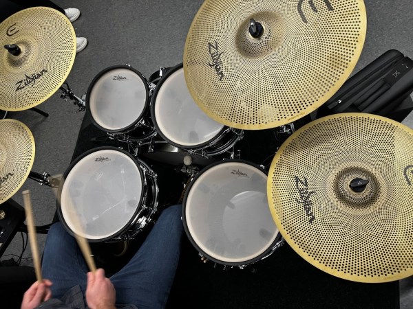 Someone playing the Zildjian e-drum kit
