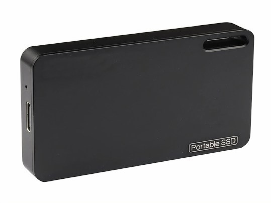 A black solid state drive on a plain background.