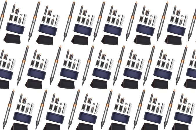 A Dyson Airwrap bundle on a plain background in a pattern
