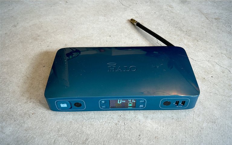 Blue Halo portable jump starter on a white counter