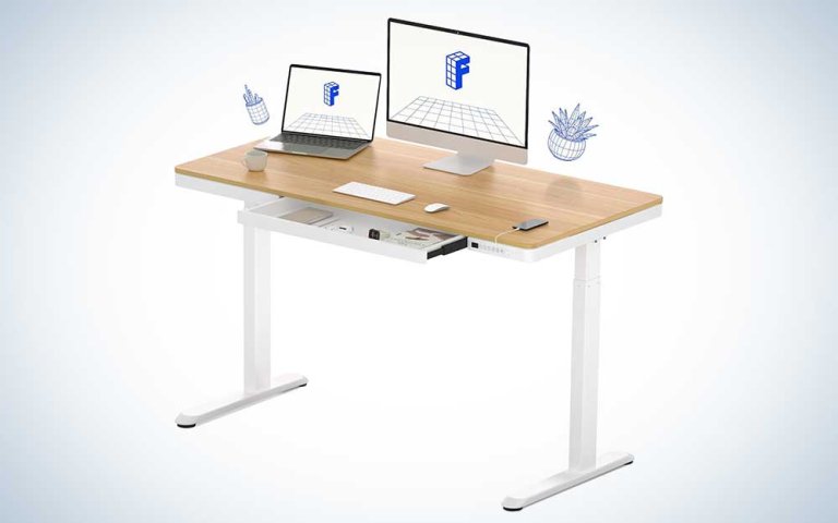 A FLEXISPOT Comhar Electric Standing Desk with Drawers standing desk on a plain background.