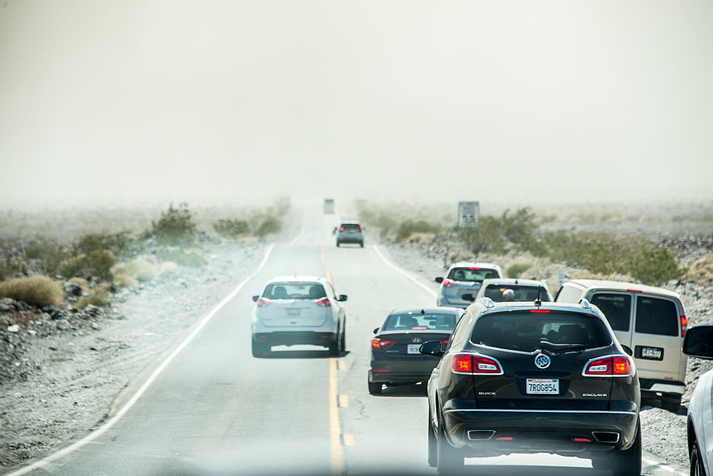 DEATH VALLEY, PANAMINT SPRINGS, CA, UNITED STATES - 2016/06/15: Cars are stopped before a dust storm with no visibility closed SR190 between Stovepipe Wells and Panamint Springs in Death Valley on June 15, 2016, in CA, United States. Dangerous, potentially record-breaking heat will scorch portions of California with temperatures climbing well past 100 degrees F in parts of California, Nevada, Utah, Colorado, Kansas, Texas, Oklahoma, New Mexico and Arizona. (Photo by Hugh Peterswald/Pacific Press/LightRocket via Getty Images)