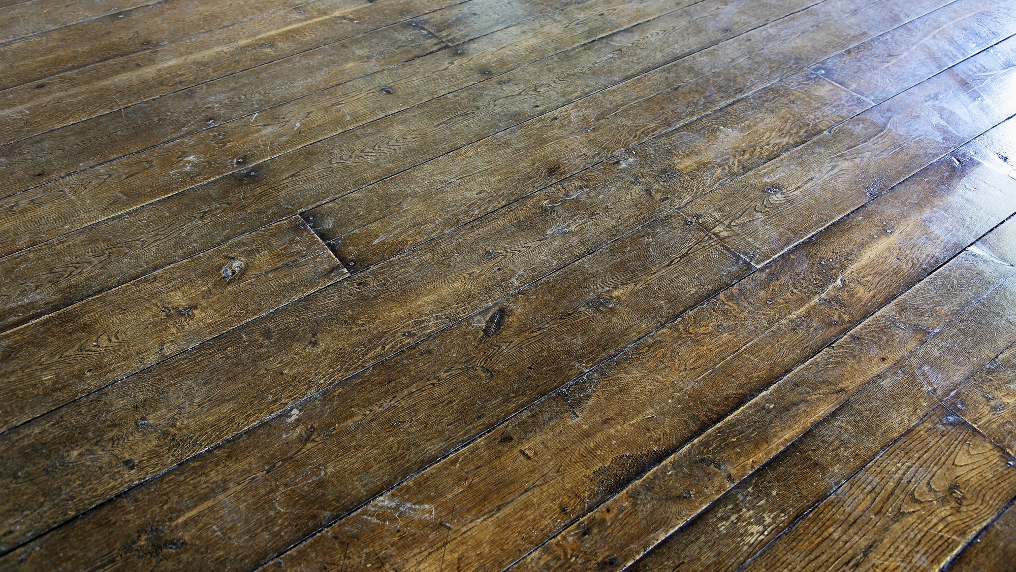 old wooden floor of boards nailed down