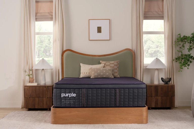 Purple RejuvenatePremier premium mattress on a wooden bed platform