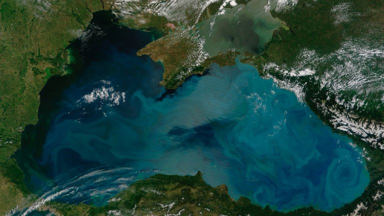 June 3, 2012 - An intense bloom of phytoplankton in the Black Sea, staining nearly every corner with a rich palette of teal, turquoise, green and milky blue. The Sea of Azov, to the northeast was also filled with swirls of color, including a touch of tan which may indicate not only phytoplankton, but sediment also circulates in those waters.