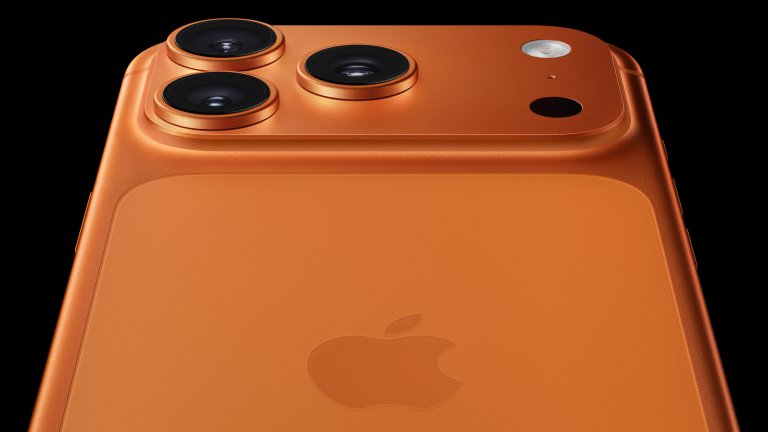 Apple iPhone 17 Pro in orange from a low angle