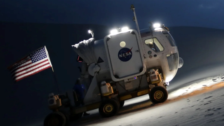 Lunar rover concept going up hill with US flag mounted on rear