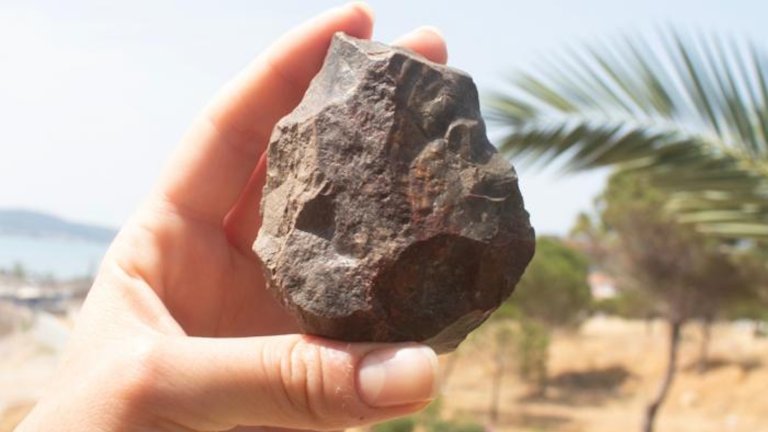 A Paleolithic handaxe with a broken distal end, discovered during the Ayvalık survey