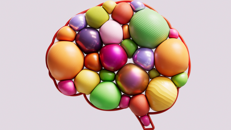 a graphic of the brain with several multi-colored balls inside