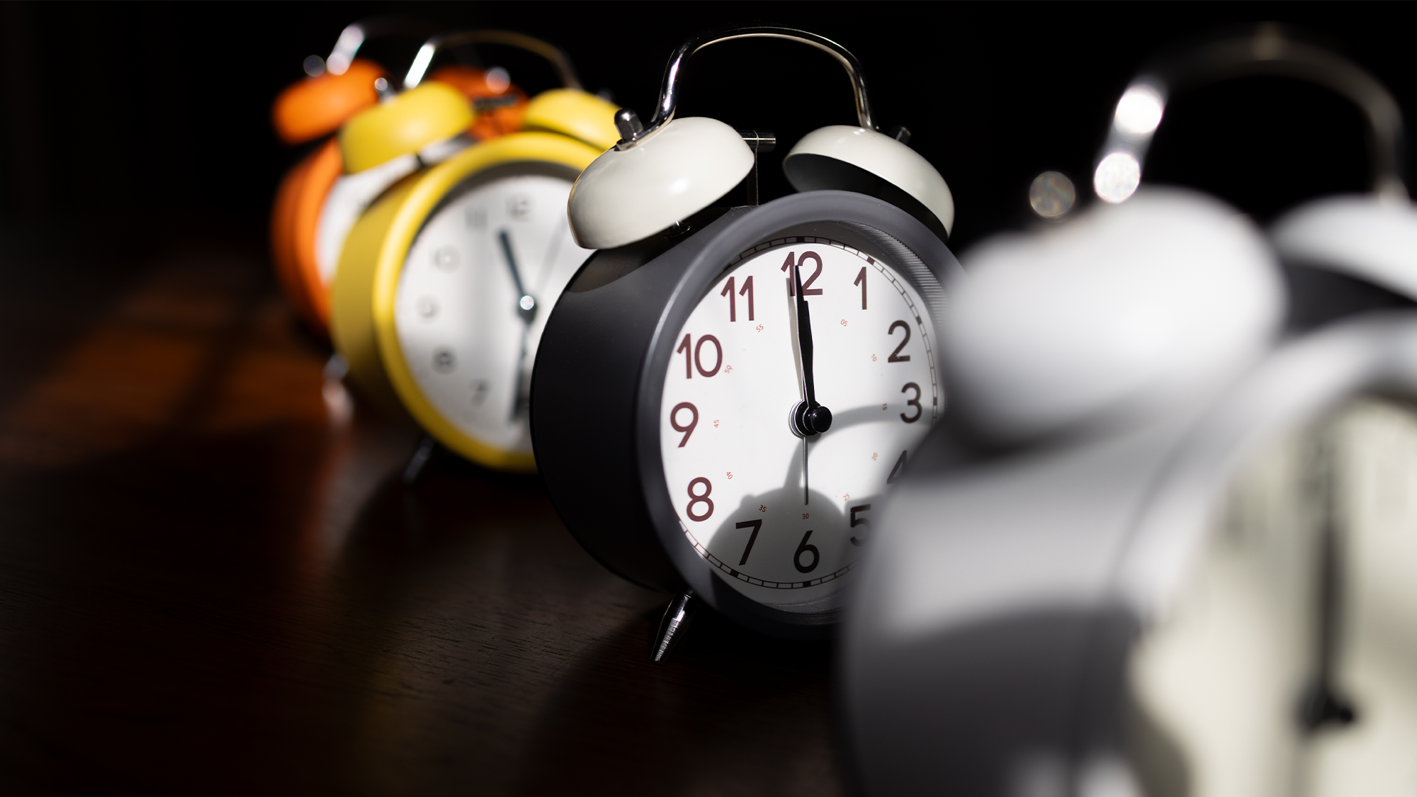 five old fashioned alarm clocks in a rowCREDIT: Catherine McQueen via Getty Images