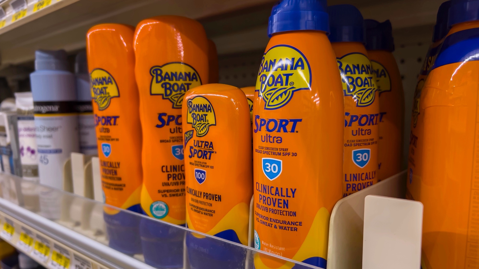 Angled, selective focus on Banana Boat sunscreen for sale inside an Albertsons grocery store