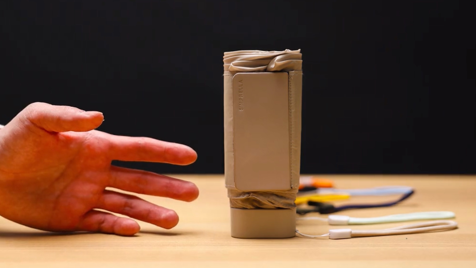 a hand and the umbrella