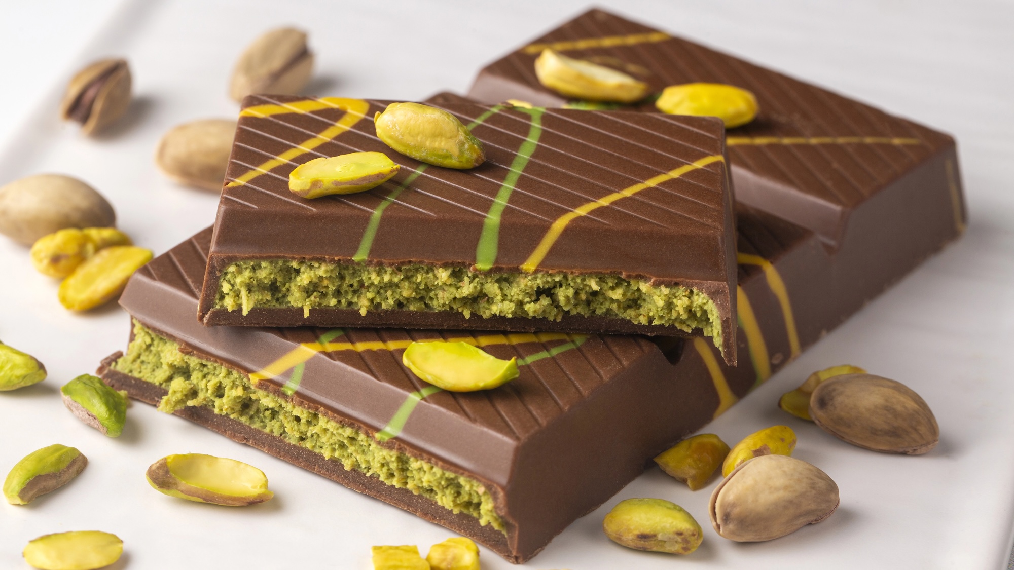 Dubai chocolate is a dessert prepared with milk and dark chocolate, roasted shredded wheat, pistachio paste and tahini.