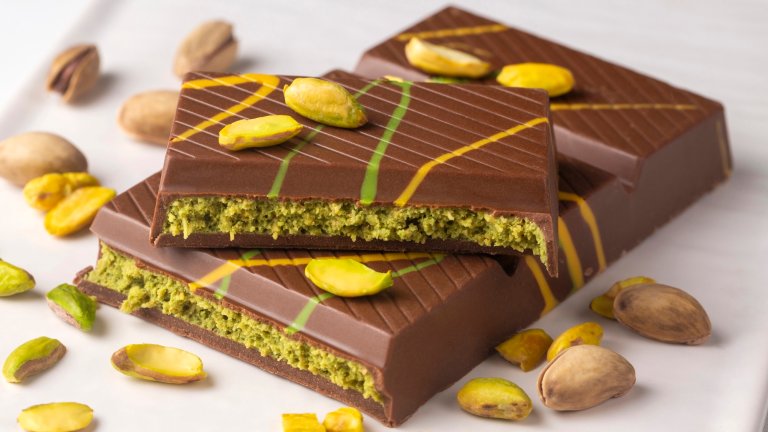 Dubai chocolate is a dessert prepared with milk and dark chocolate, roasted shredded wheat, pistachio paste and tahini.
