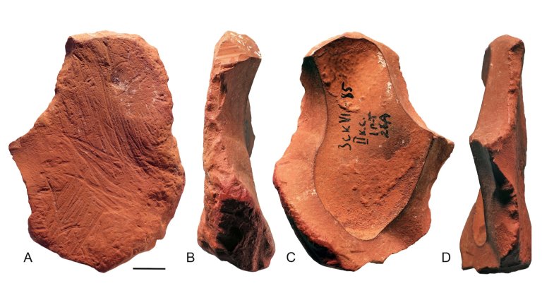Four views of ochre fragment used by Neanderthals