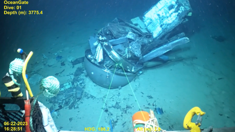ROV screenshot of dive to Titan submersible debris on ocean floor