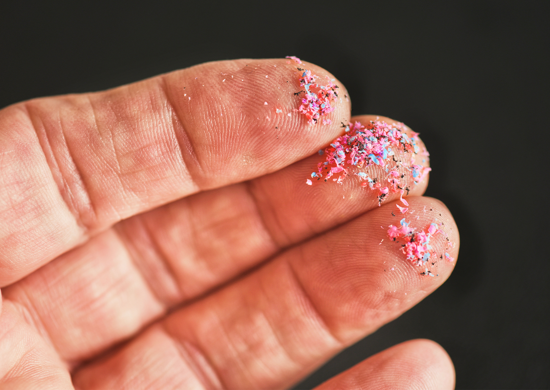 small fragments of pink plastic