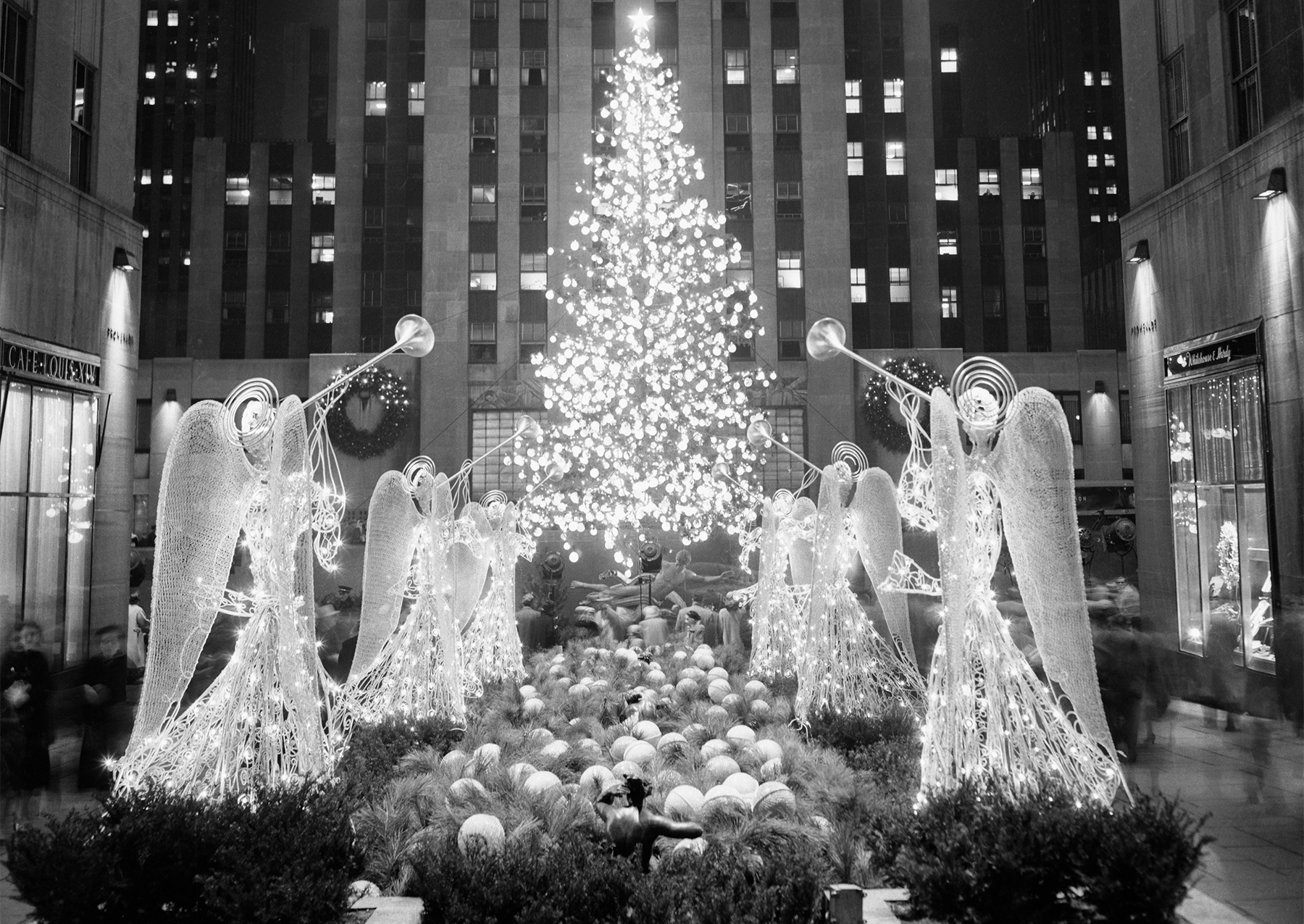 The 1955 Rockefeller Center Christmas tree. The tree was decorated some 2,500 bulbs and 1,400 globes: red, white, blue and yellow.