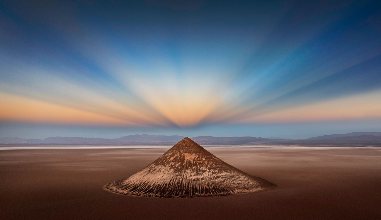 a volcanic peak in a desert