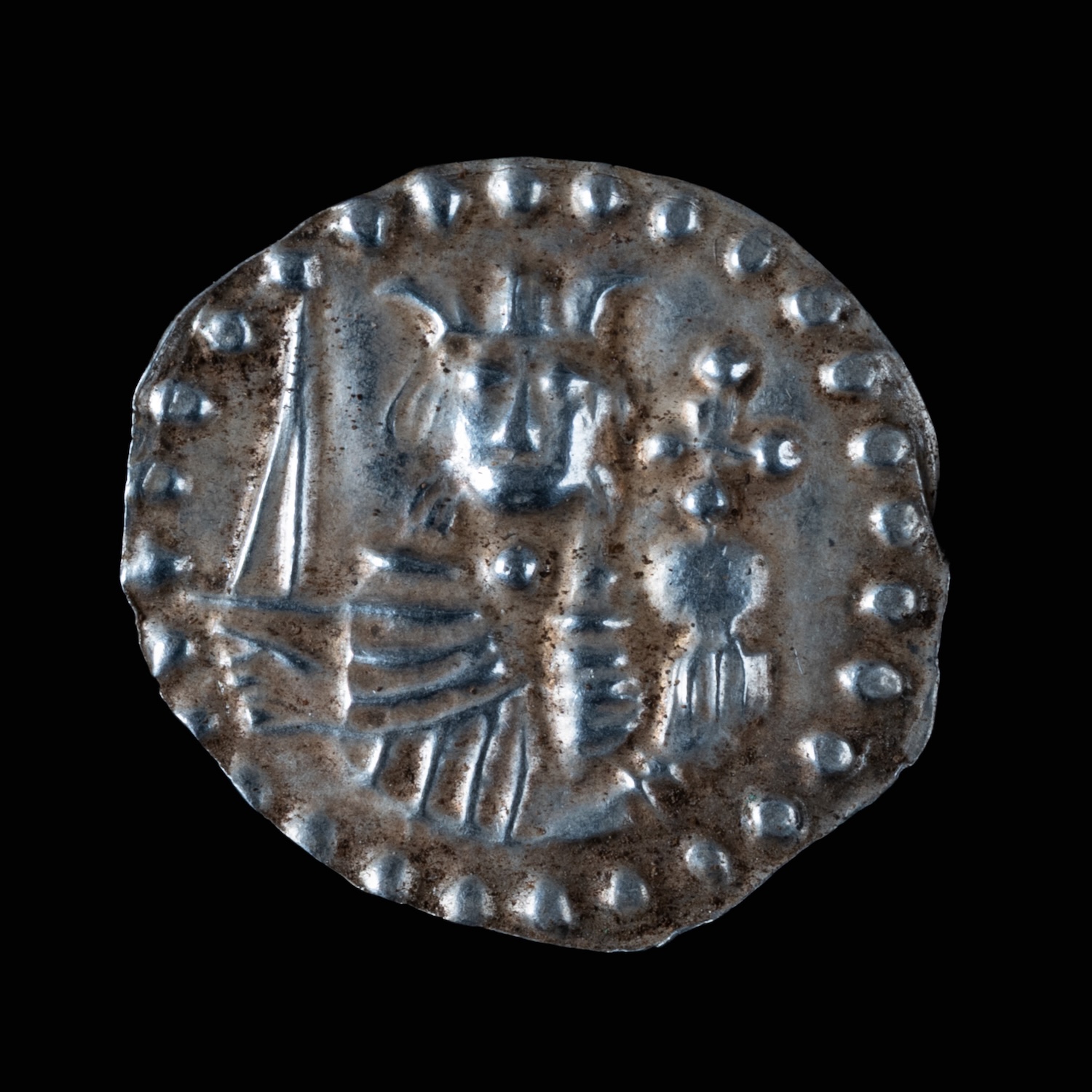 Silver coin depicting a medieval Swedish king