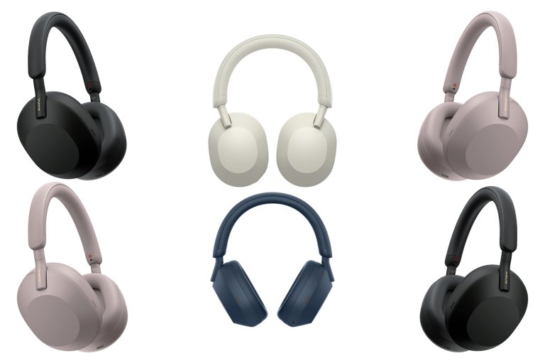 A bunch of black, white, blue, and pink Sony WH-1000XM5 wireless headphones on a white background