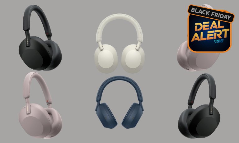 A bunch of black, white, blue, and pink Sony WH-1000XM5 wireless headphones on a gray Amazon Black Friday background