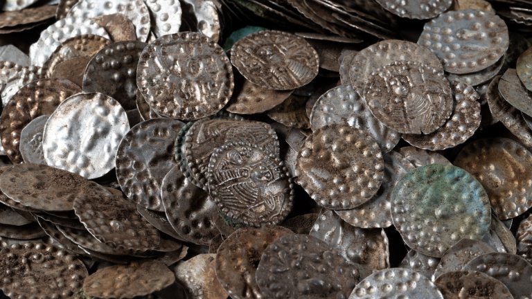 Swedish silver medieval coins in a pile