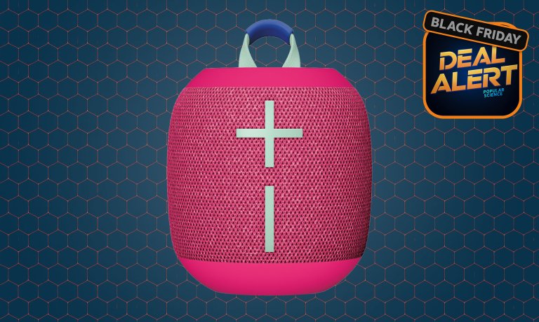 Pink Ultimate Ears Wonderboom 4 portable Bluetooth waterproof speaker on a blue Amazon Black-Friday product card background
