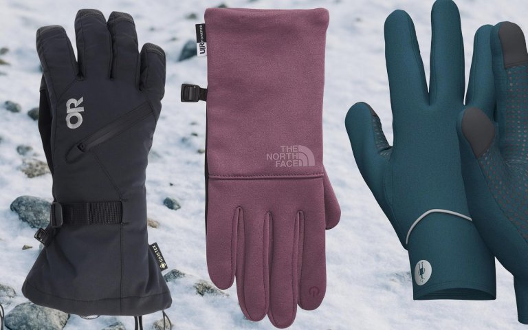 Outdoor Research, The North Face, Smartwool gloves on a snowy background on sale at REI