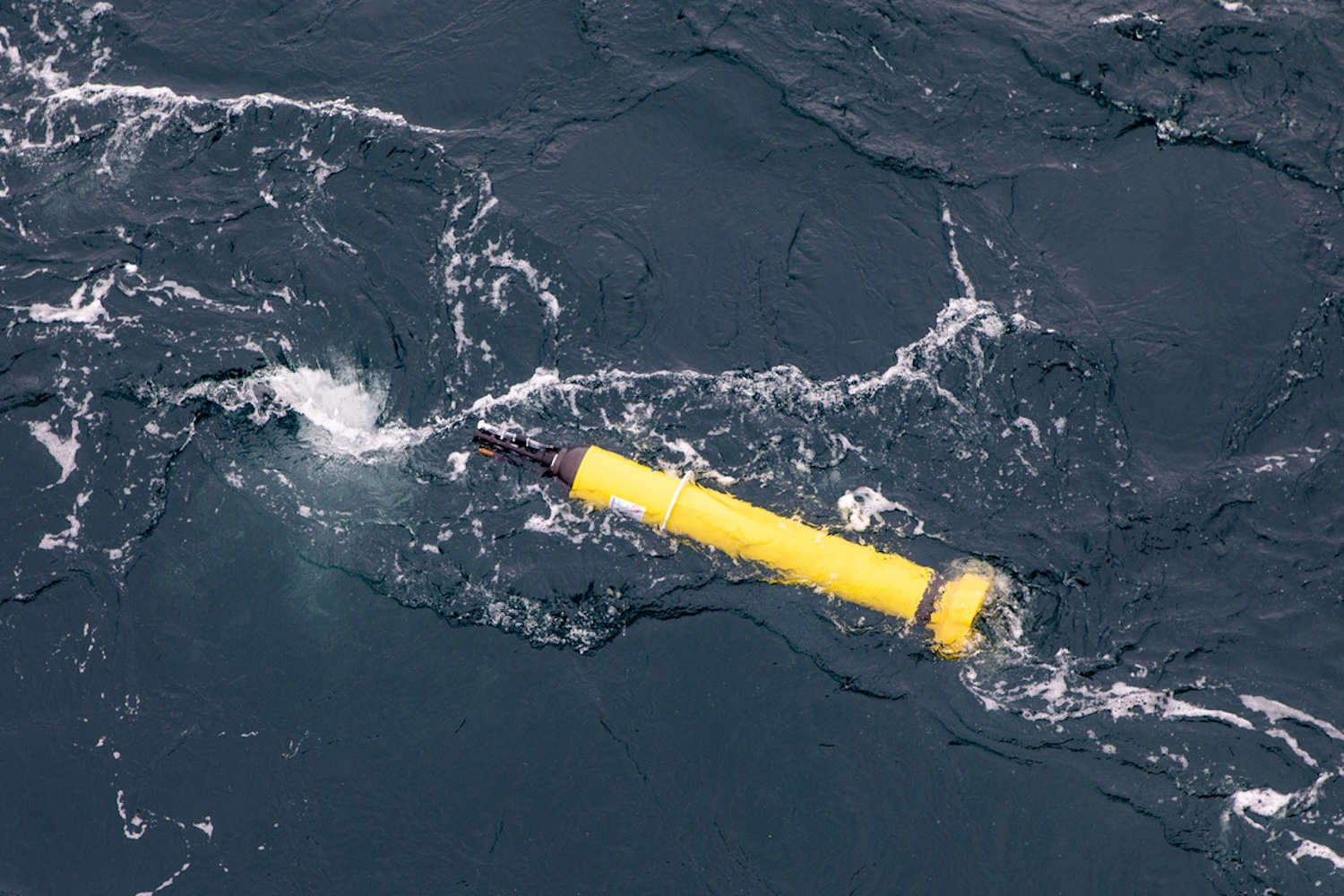 Yellow Argo float at ocean surface in Antarctica