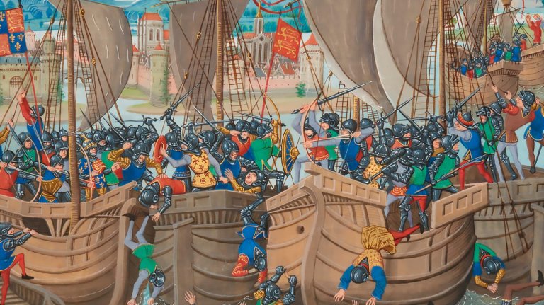 An illustration depicting a fierce naval battle, identified as the Battle of Sluys. Two large, wooden medieval ships are shown locked together, full of soldiers fighting hand-to-hand. The decks are crowded with men in armour, many wearing bascinet-style helmets and some carrying shields, engaged in close combat with swords, axes, and spears. On the right ship, several English archers are prominently shown drawing their longbows, firing towards the opposing vessel. Men in brightly coloured tunics (blue, red, green, yellow) are falling or being pushed overboard into the water between the ships. In the background, beyond the battle, is a walled port city with large buildings and towers. The flags visible include the English royal standard (three gold fleurs-de-lis on a blue background, and three gold lions on a red background, quarterly) and a red banner with a gold lion.