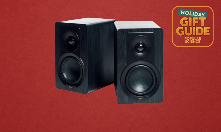 Black Ash DALI KUPID Premium Compact Passive Speakers on a red holiday gift guide background
