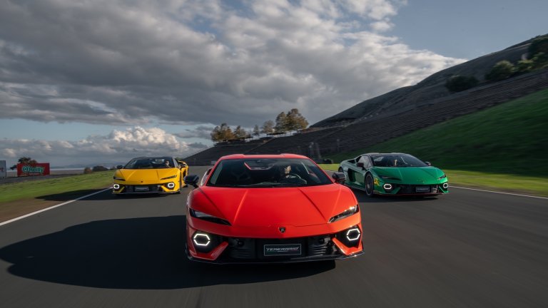 three Lamborghinis driving