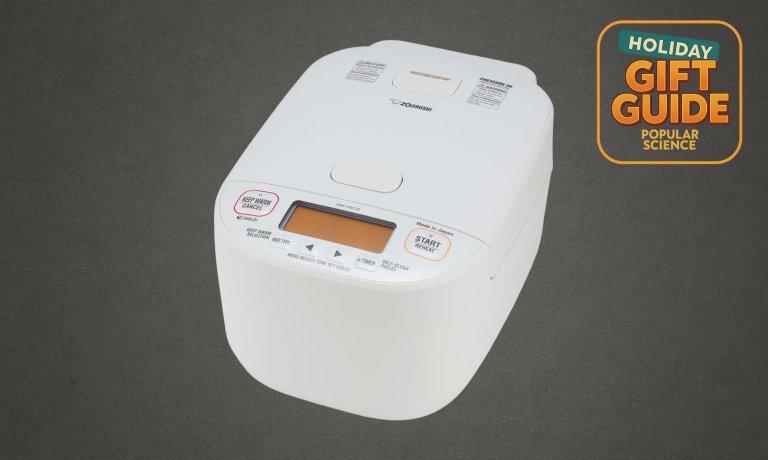 White Zojirushi NW-YNC10WA Induction Rice Cooker on grey holiday gift guide background