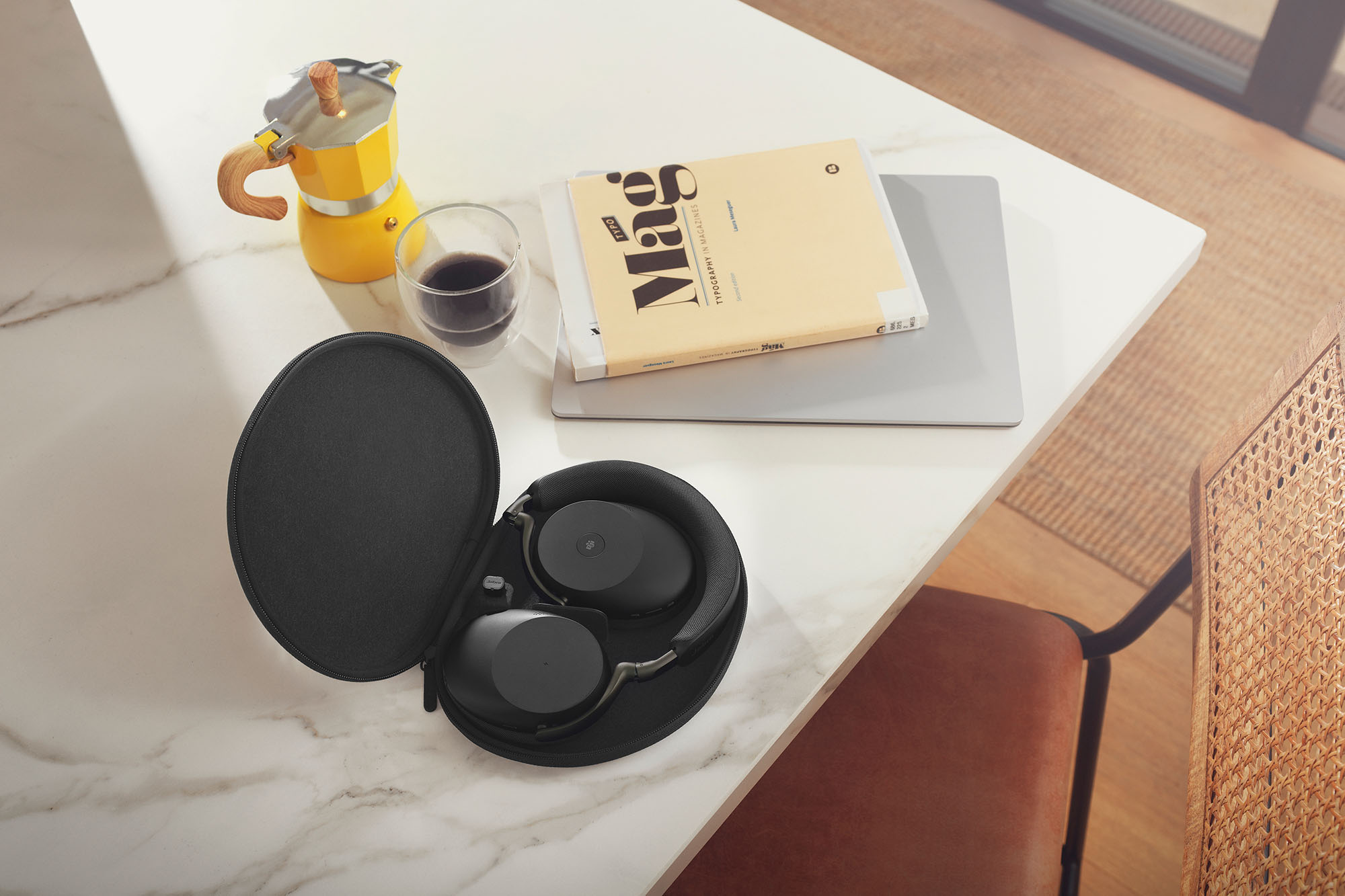 A black Jabra Evolve3 85 headset folded in its case