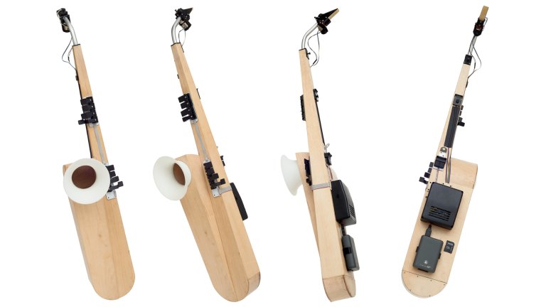 Four images side-by-side showing angles of a saxophone-inspired instrument called the Post Digital Sax