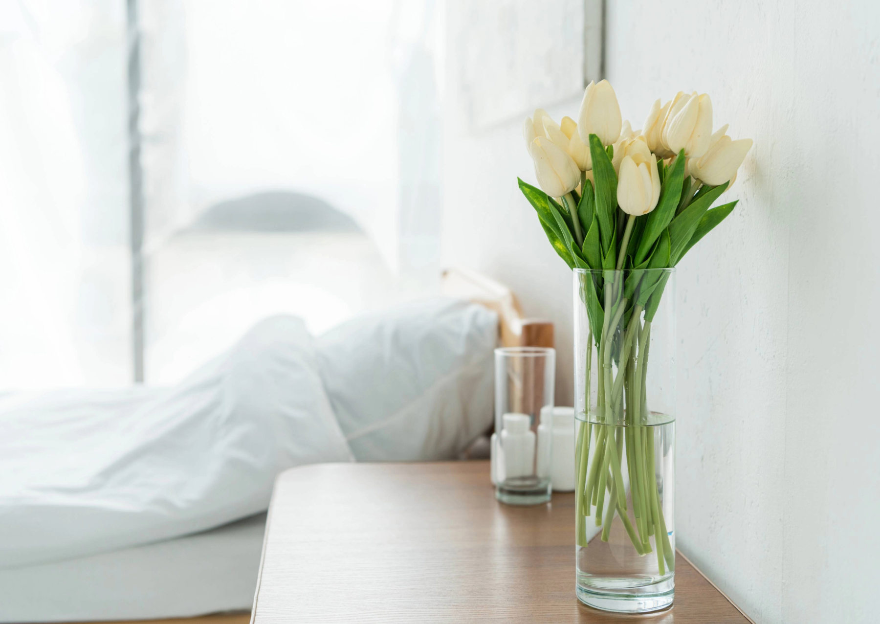 Why humans live and die for love插图2 an empty hospital bed with flowers by a table