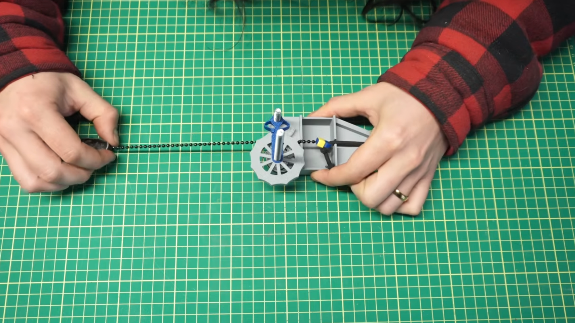 a pulley system with a ceiling fan chain