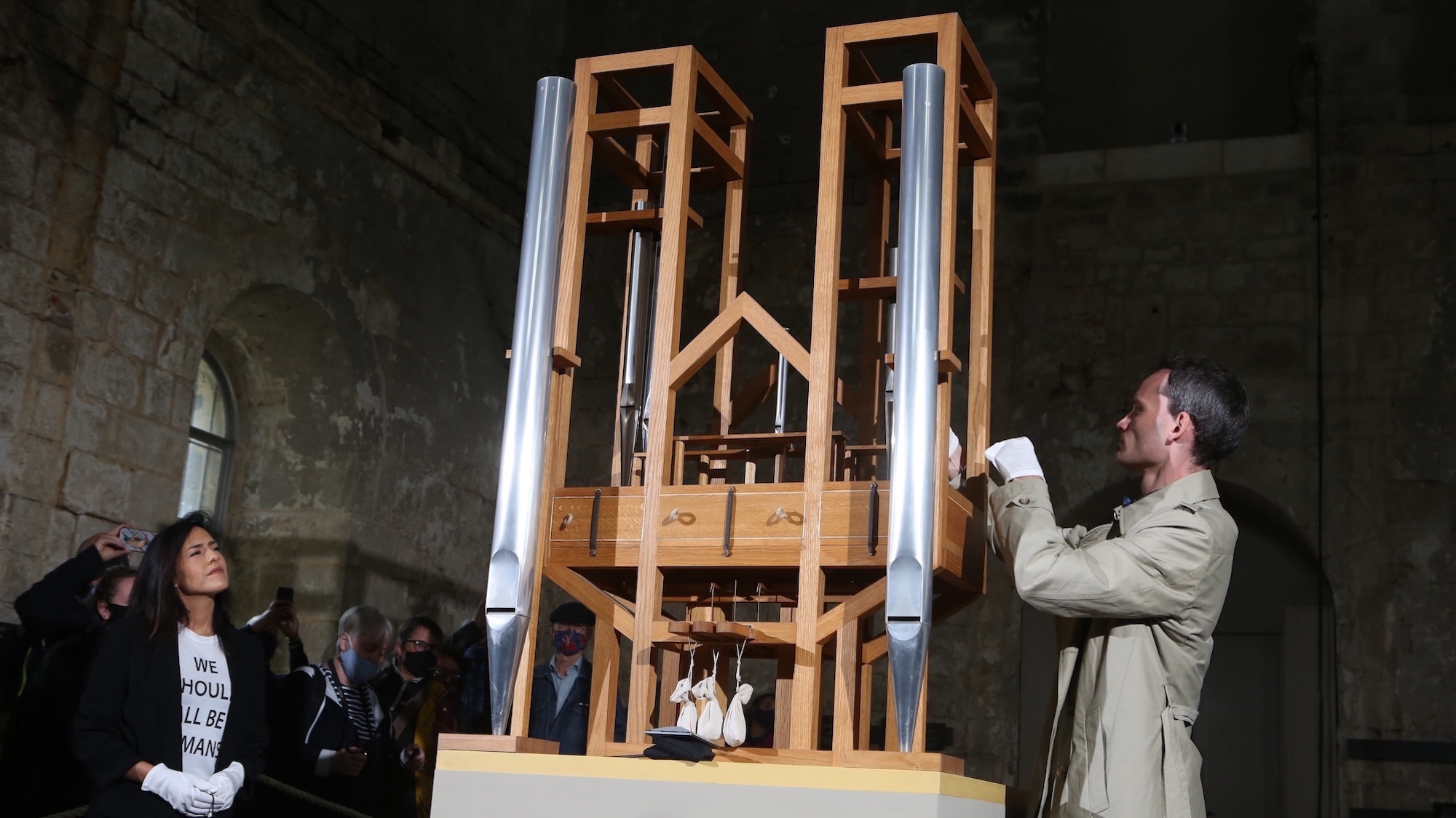 05 September 2020, Saxony-Anhalt, Halberstadt: Soprano Johanna Vargas (l) and composer Julian Lembke (r) use the organ pipes. Since 2001 the organ has been playing the music piece "ORGAN2/ASLSP" by John Cage without interruption. It is said to last 639 years. On Saturday, September 5, 2020, the 14th sound change of the John Cage Organ Art Project Halberstadt has been completed. In addition to the previous five pipes c'(16'), des'(16'), dis', ais' and e'', there are two new pipes g sharp and e. The next sound lasts until February 5, 2022. Then the g sharp will be dropped again. If everything goes as planned, the performance of the piece will last until the year 2640 Photo: Matthias Bein/dpa-Zentralbild/dpa (Photo by Matthias Bein/picture alliance via Getty Images)