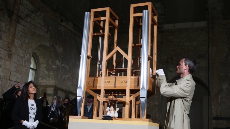 05 September 2020, Saxony-Anhalt, Halberstadt: Soprano Johanna Vargas (l) and composer Julian Lembke (r) use the organ pipes. Since 2001 the organ has been playing the music piece "ORGAN2/ASLSP" by John Cage without interruption. It is said to last 639 years. On Saturday, September 5, 2020, the 14th sound change of the John Cage Organ Art Project Halberstadt has been completed. In addition to the previous five pipes c'(16'), des'(16'), dis', ais' and e'', there are two new pipes g sharp and e. The next sound lasts until February 5, 2022. Then the g sharp will be dropped again. If everything goes as planned, the performance of the piece will last until the year 2640 Photo: Matthias Bein/dpa-Zentralbild/dpa (Photo by Matthias Bein/picture alliance via Getty Images)
