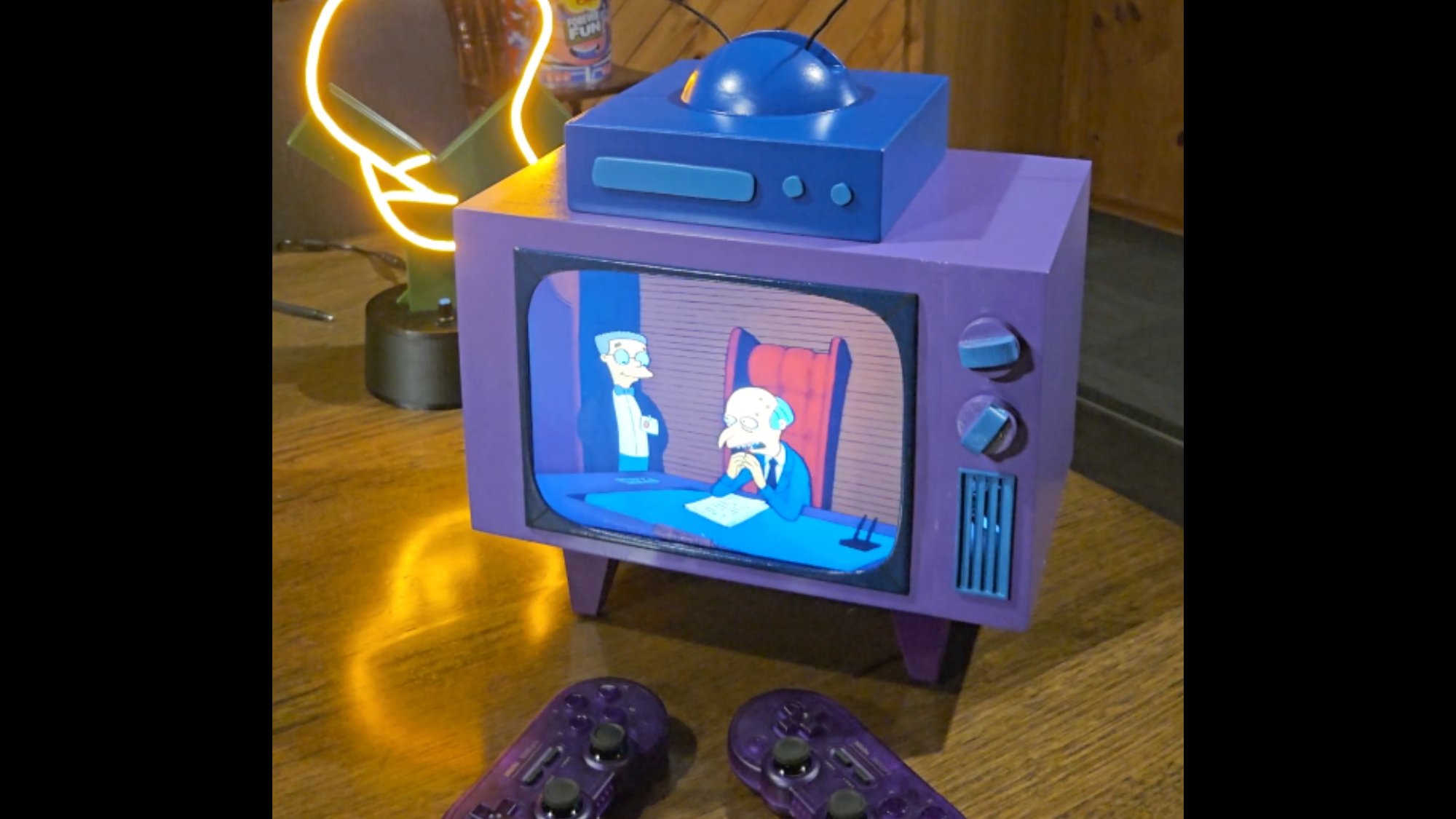Miniature 3D printed TV airing an episode of The Simpsons