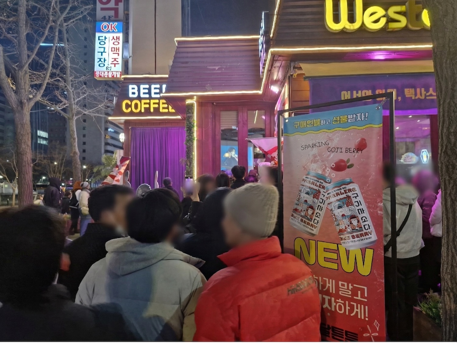 people standing outside a restaurant