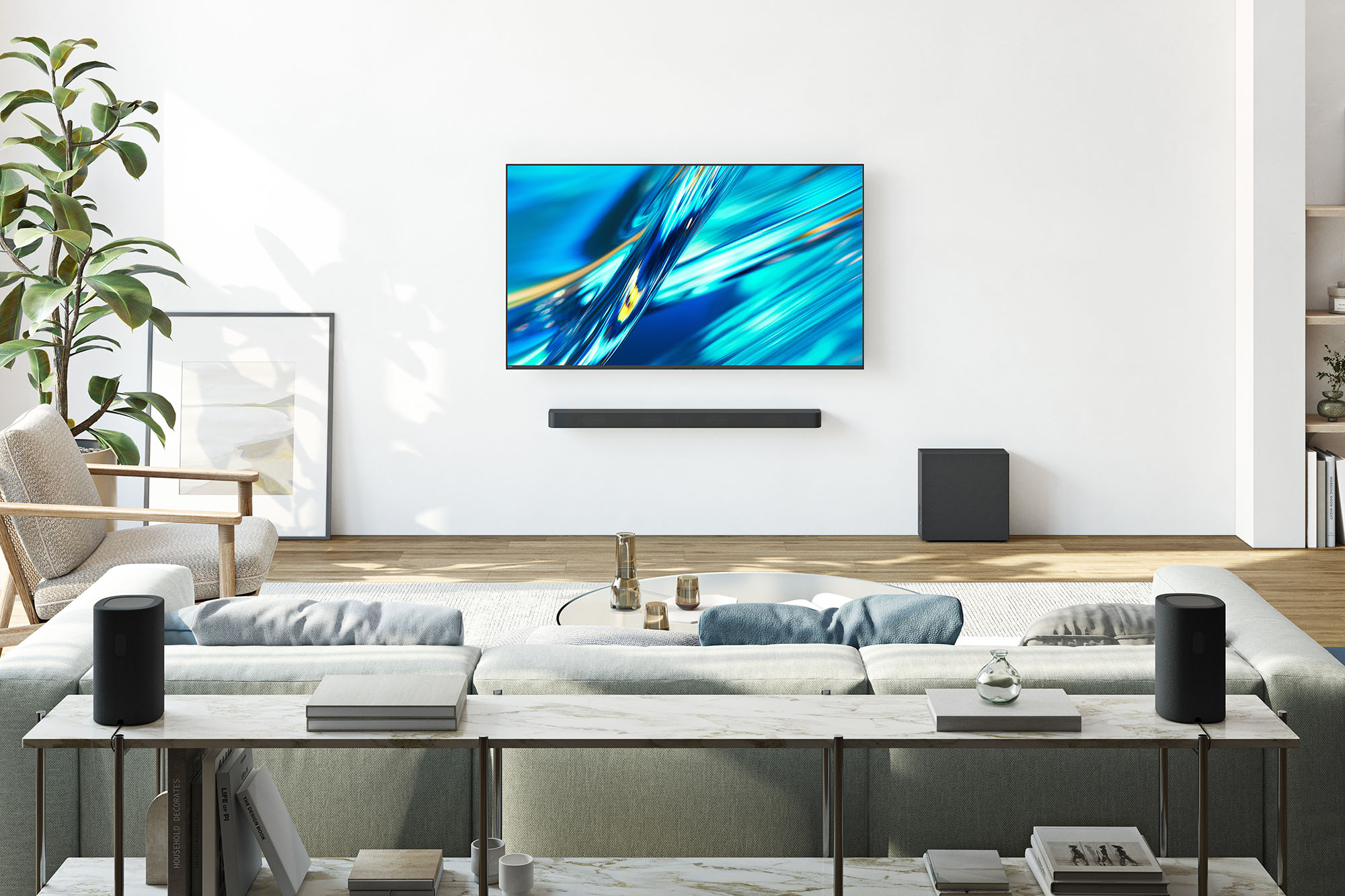 A Sony BRAVIA Bar 7 and Sub 9 and Rear 9 in a living room setting with a wall-mounted TV