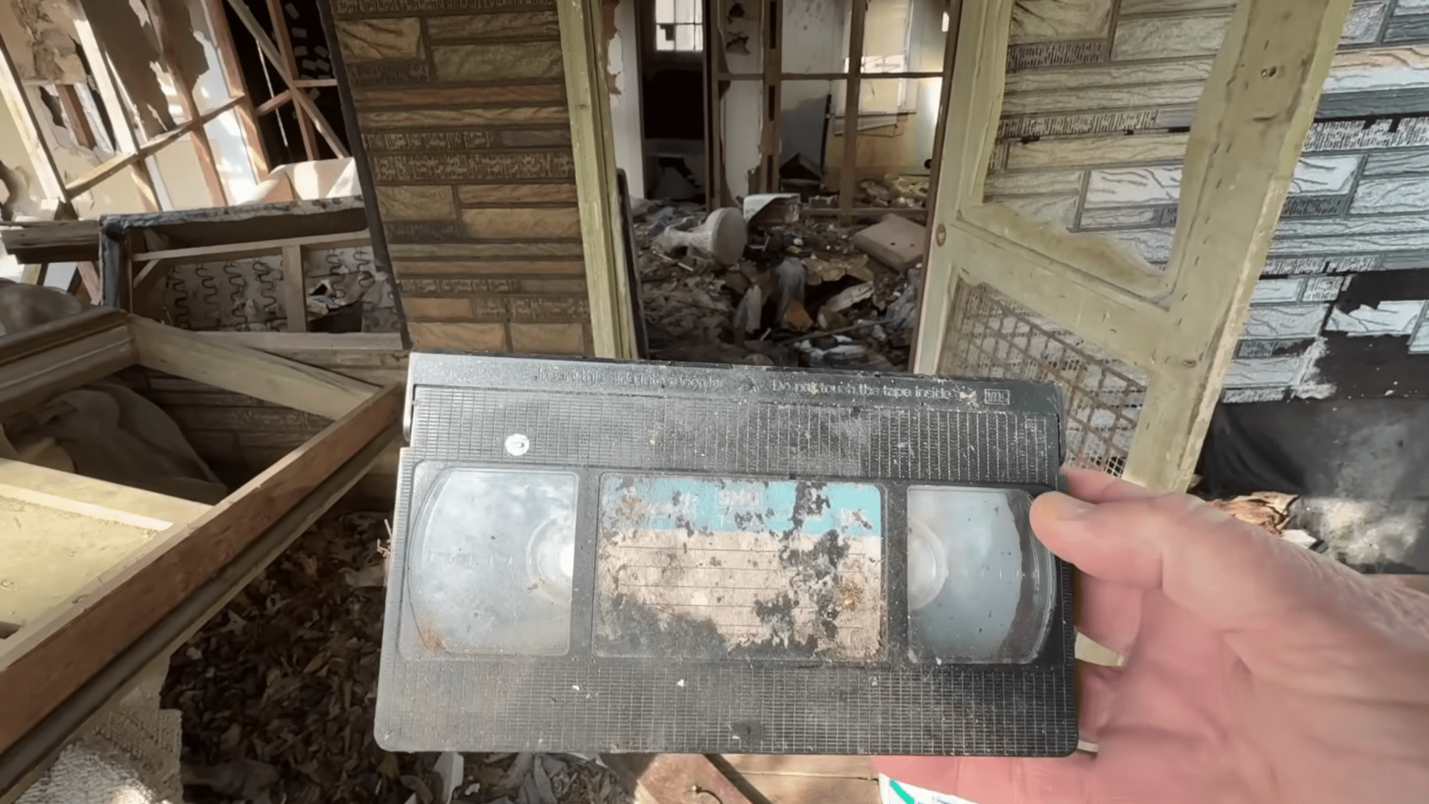 a VHS tape covered in dirt