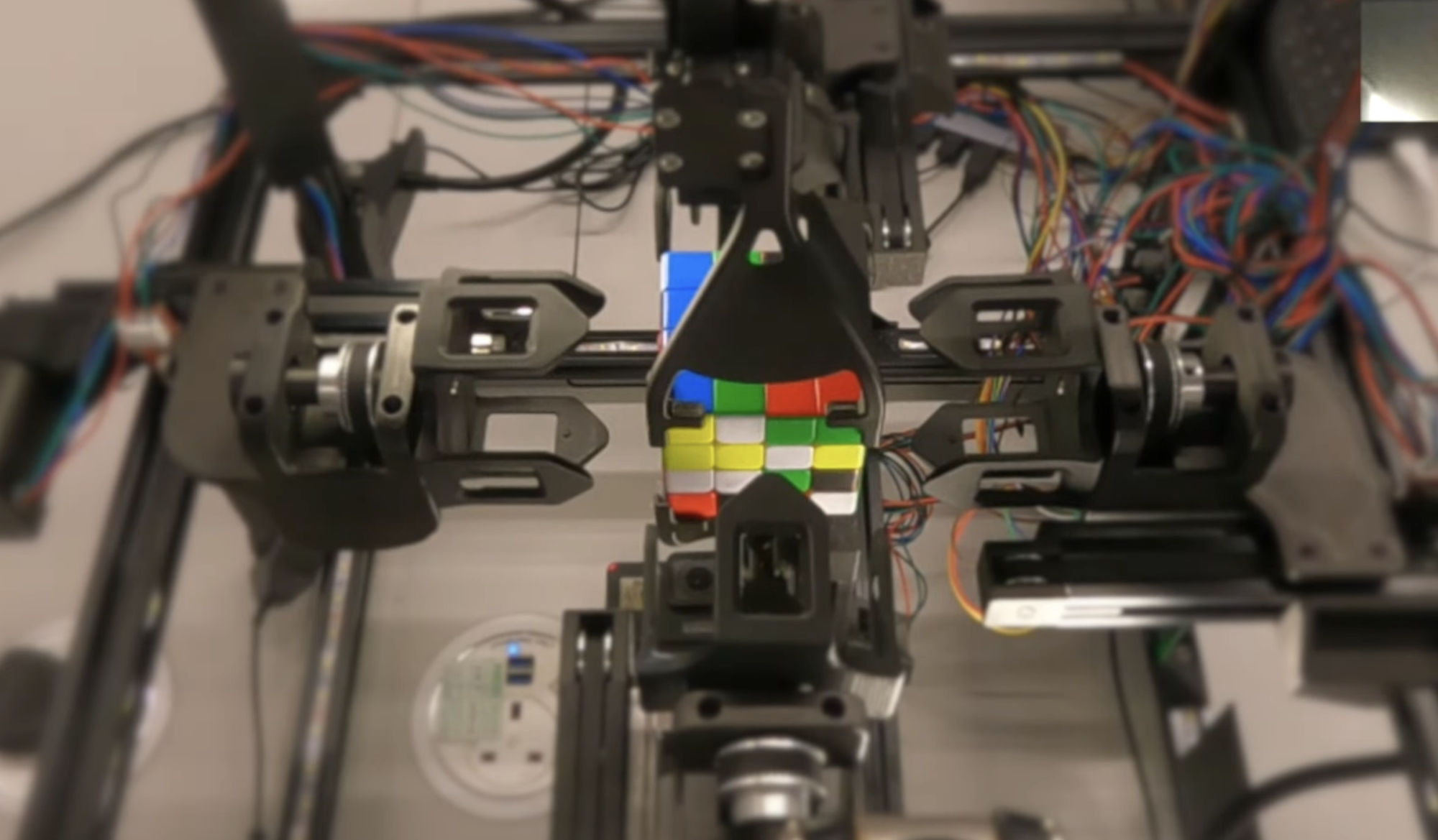robot working on rubik's cube