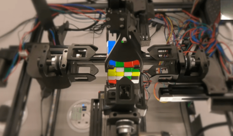 robot working on rubik's cube