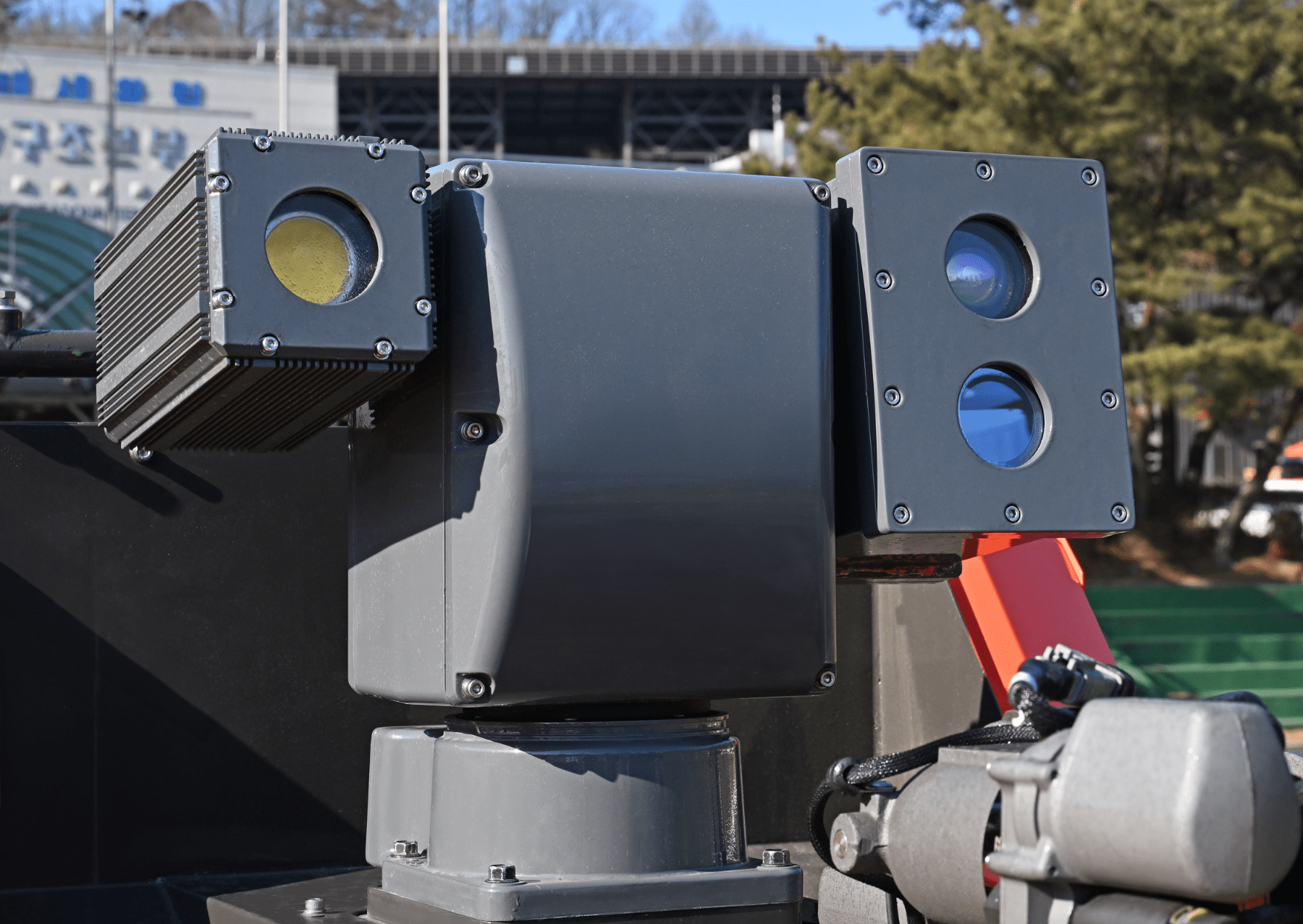 a black box on top of a robot with senors