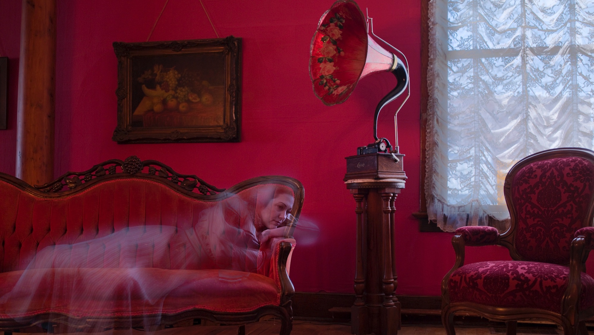 19th century female ghost listening to phonograph