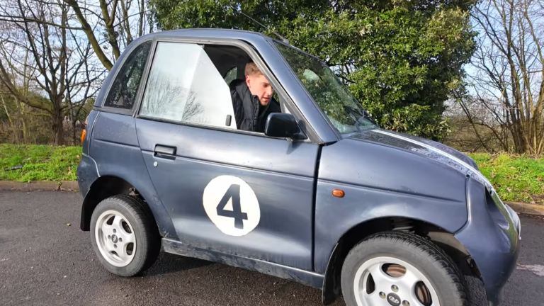 a small black car with a number 4 on it